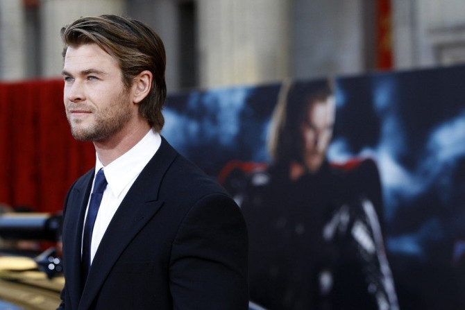 Cast member Chris Hemsworth Poses at the Premiere of &quot;Thor&quot; at the El Capitan theatre in Hollywood