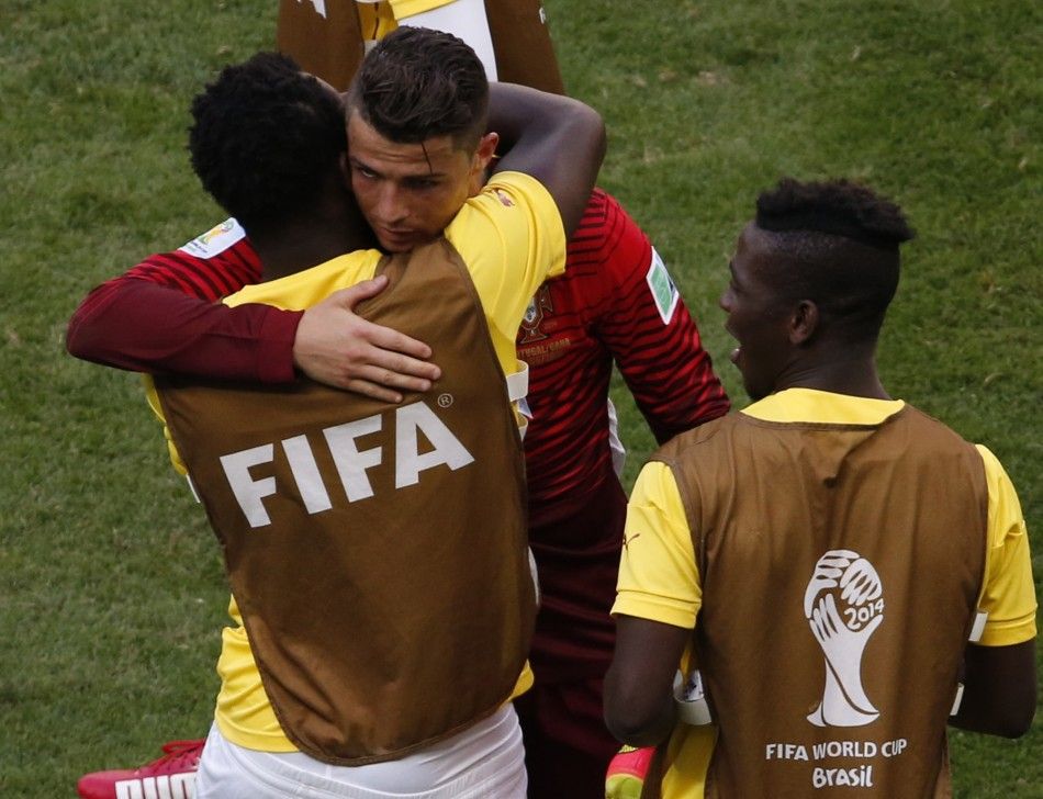 Portugals Cristiano Ronaldo C is consoled by Ghana players 
