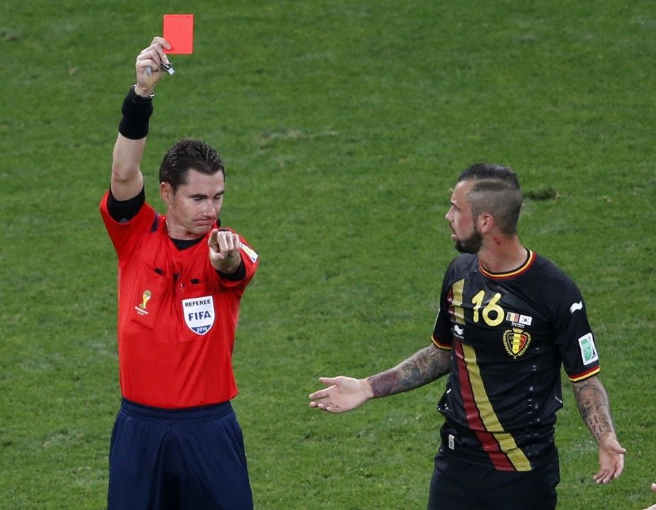 Referee Benjamin Williams of Australia shows Belgiums Steven Defour the red card
