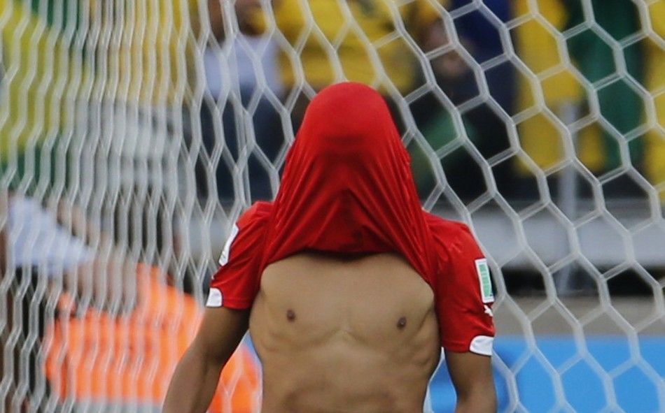 Chiles Alexis Sanchez reacts after his penalty shot was saved 