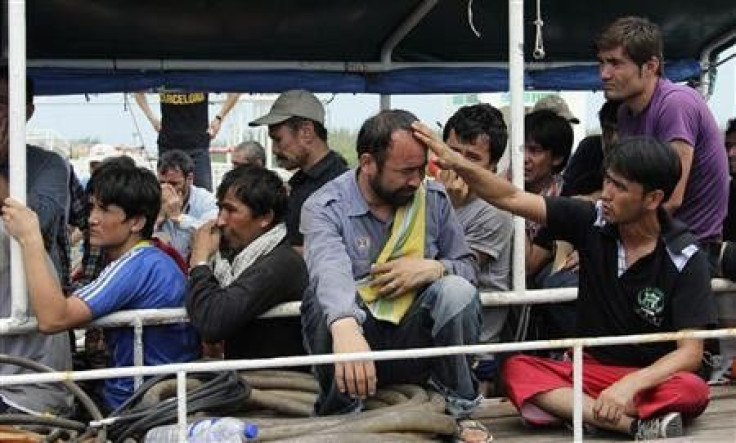 Asylum Seekers from Afghanistan, Iraq and Iran Cry as Indonesian Officers Force Them to Leave the Australian Vessel Hermia
