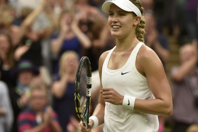 Eugenie Bouchard of Canada reacts after defeating Alize Cornet of France in their women&#039;s singles tennis match at the Wimbledon Tennis Championships, in London