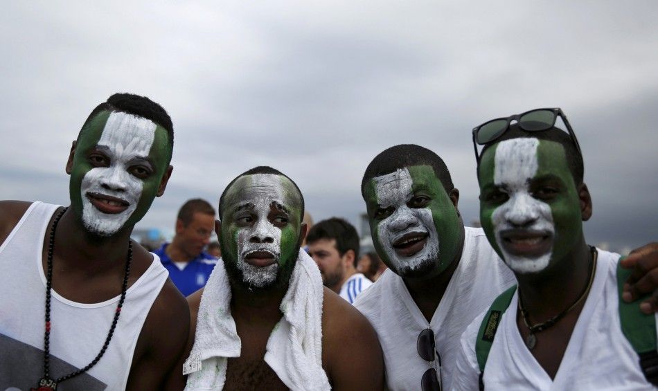 Nigerian soccer fans pose for pictures