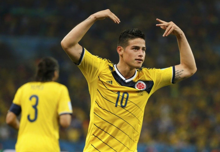 Colombia&#039;s James Rodriguez celebrates after scoring his second goal during the 2014 World Cup round of 16 game between Colombia and Uruguay at the Maracana stadium in Rio de Janeiro