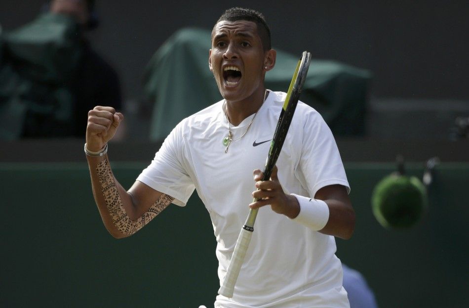 Nick Kyrgios of Australia reacts during his mens singles tennis match against Rafael Nadal of Spain at the Wimbledon Tennis Championships, in London July 1, 2014. 