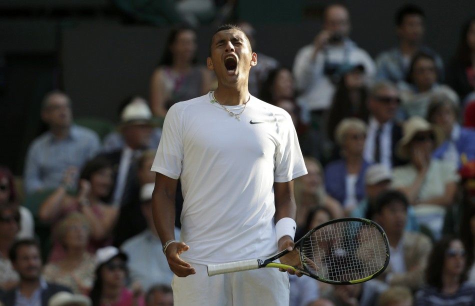 Nick Kyrgios of Australia reacts during his mens singles tennis match against Rafael Nadal of Spain at the Wimbledon Tennis Championships, in London July 1, 2014.