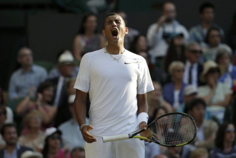Nick Kyrgios of Australia reacts during his men's singles tennis match against Rafael Nadal of Spain at the Wimbledon Tennis Championships, in London July 1, 2014.