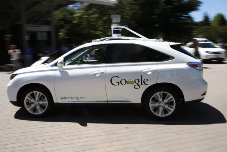 File photo of a Google self-driving vehicle driving around the parking lot at the Computer History Museum after a presentation in Mountain View, California