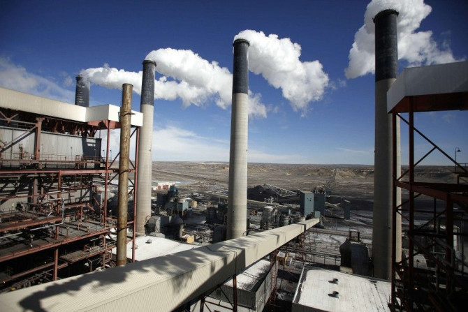 Steam rises from the stacks of the coal-fired Jim Bridger Power Plant outside Point of the Rocks, Wyoming in this file photo taken March 14, 2014. The U.S. power sector must cut carbon dioxide emissions 30 percent by 2030 from 2005 levels, according to fe