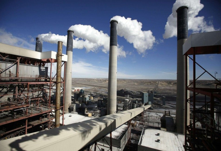 Steam rises from the stacks of the coal-fired Jim Bridger Power Plant outside Point of the Rocks, Wyoming in this file photo taken March 14, 2014. The U.S. power sector must cut carbon dioxide emissions 30 percent by 2030 from 2005 levels, according to fe