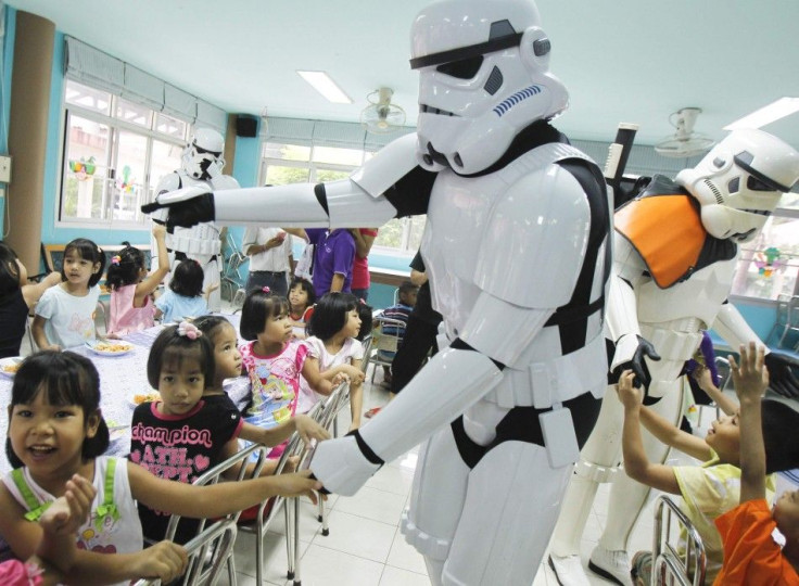 Star Wars Fan Club Dressed as Stormtroopers Interact with Children 