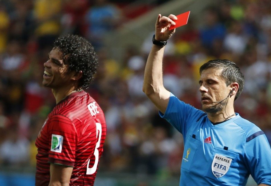 Portugals Pepe is shown the red card by referee Milorad Mazic of Serbia R for committing a rough foul against Germanys Thomas Mueller not pictured during their 2014 World Cup Group G soccer match at the Fonte Nova arena in Salvador, June 16, 2014. 