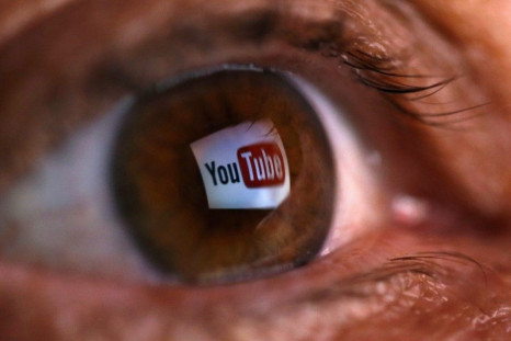 A picture illustration shows a YouTube logo reflected in a person&#039;s eye