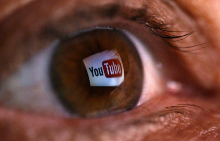 A picture illustration shows a YouTube logo reflected in a person&#039;s eye