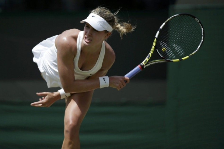 Eugenie Bouchard of Canada serves during her women's singles quarter-final tennis match against Angelique Kerber of Germany at the Wimbledon Tennis Championships, in London July 2, 2014.