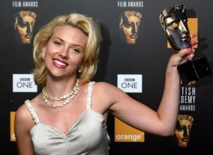 Scarlett Johansson holds her award for Best Actress for Lost in Translation at the BAFTA (British Academy of Film and Television Arts) awards in London, February 15, 2004.