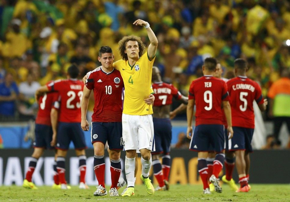 Brazils David Luiz 4 gestures at Colombias James Rodriguez 10 