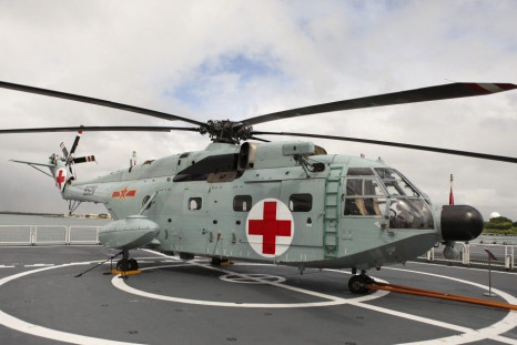 A Z-JH8 helicopter sits on the deck of the Chinese People Liberation Army Naval hospital ship Peace Ark at Joint Base Pearl Harbor Hickam in Honolulu, Hawaii, July 5, 2014.