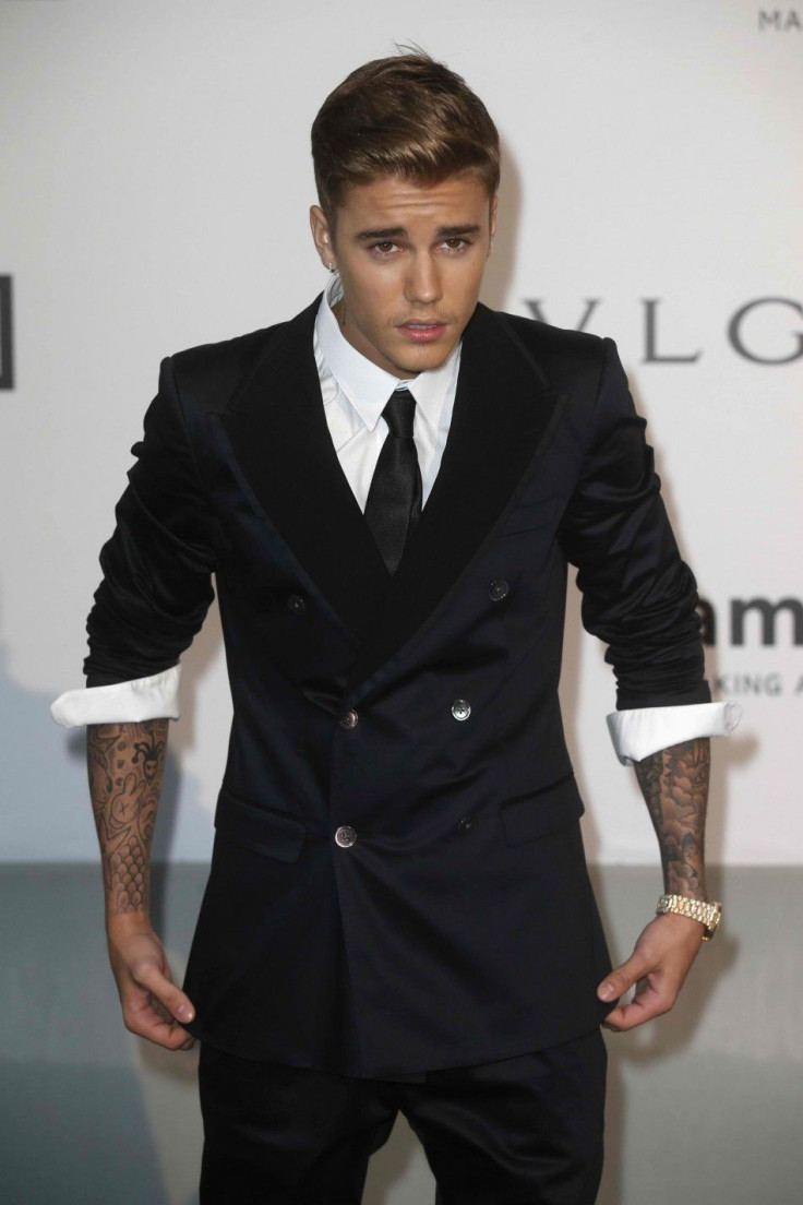 Canadian pop singer Justin Bieber arrives for amfAR's Cinema Against AIDS 2014 event in Antibes during the 67th Cannes Film Festival in this file photo from May 22, 2014.