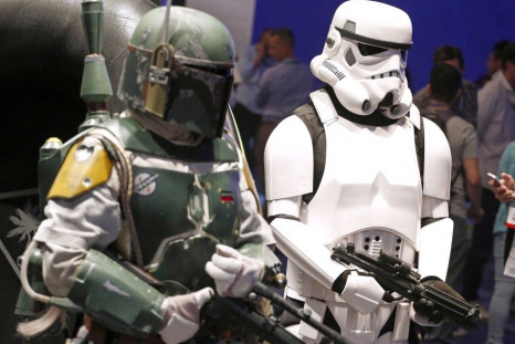 People dressed as &quot;Star Wars&quot; characters Boba Fett and a Stormtrooper pose at the 2014 Electronic Entertainment Expo, known as E3, in Los Angeles