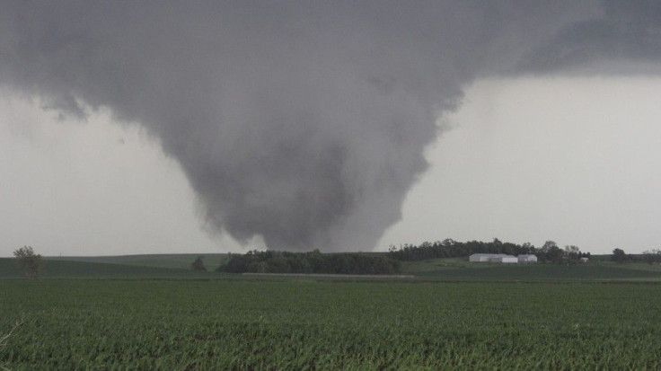 A tornado touches down near Pilger, Nebraska June 16, 2014. REUTERS/Dustin Wilcox/TwisterChasers