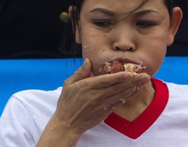 Contestant Sonya Thomas competes in the annual Nathan&#039;s Famous Fourth of July Hot Dog Eating Contest at Coney Island in the Brooklyn borough of New York