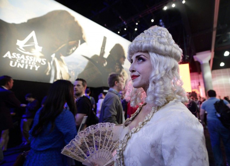 A Woman Dressed As Marie Antoinette From The Video Game 'Assassin's Creed: Unity' Promotes The Game In The Ubisoft Booth At The 2014 Electronic Entertainment Expo, Known As E3, In Los Angeles
