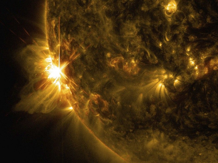 A Solar Flare Bursts Off The Left Limb Of The Sun In This Image Captured By NASA's Solar Dynamics Observatory