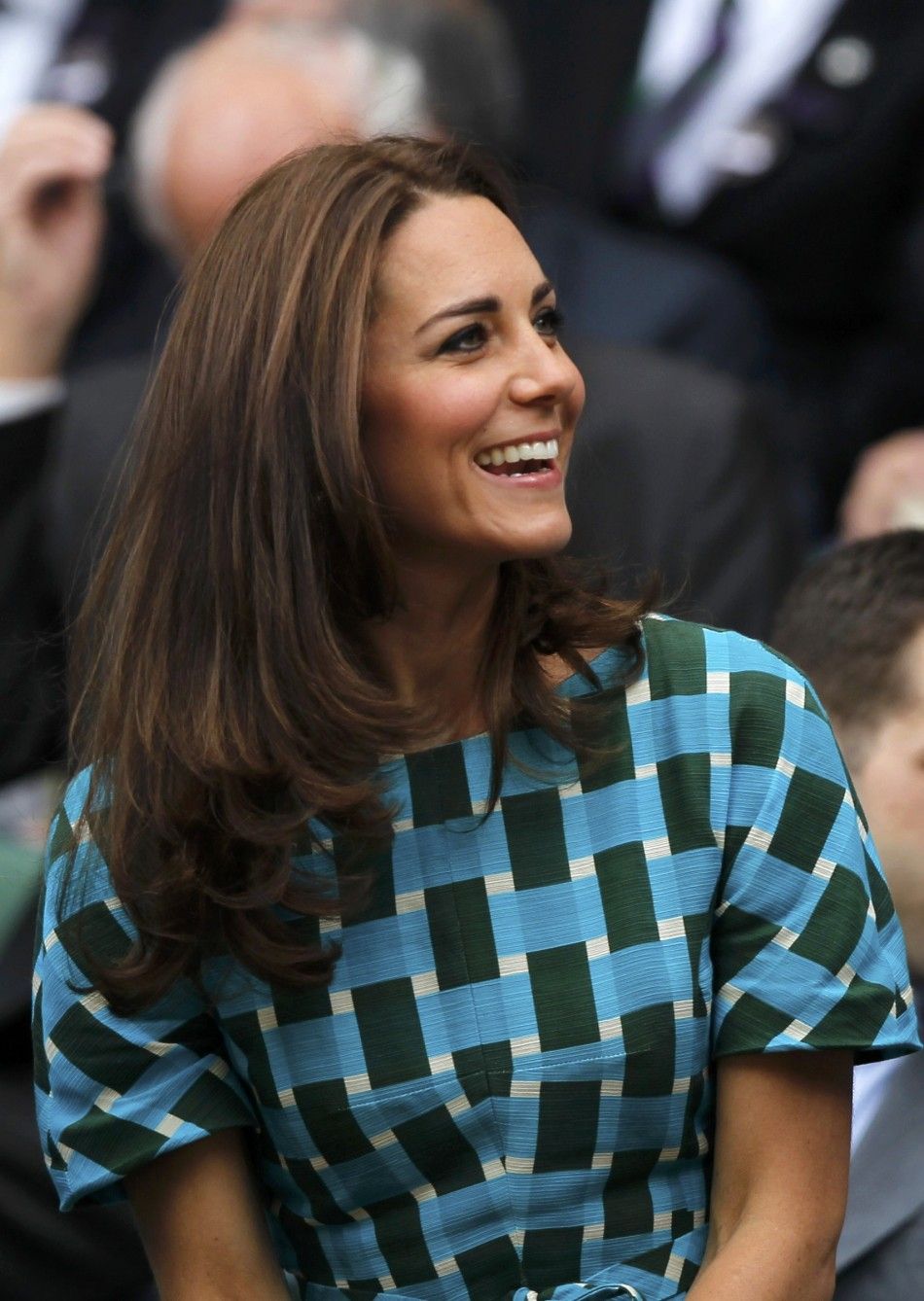 Britain039s Catherine, Duchess of Cambridge sits on Centre Court at the Wimbledon Tennis Championships, in London
