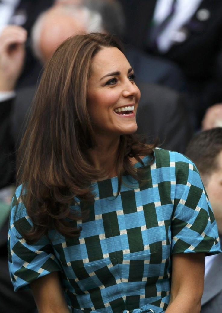 Britain&#039;s Catherine, Duchess of Cambridge sits on Centre Court at the Wimbledon Tennis Championships, in London