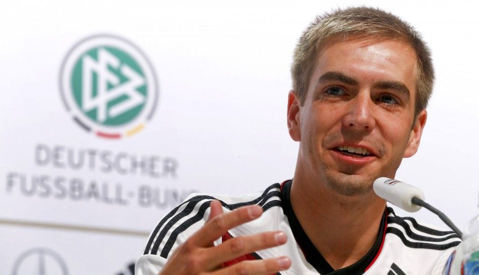 Germanys national soccer team player Lahm addresses a news conference in the village of Santo Andre