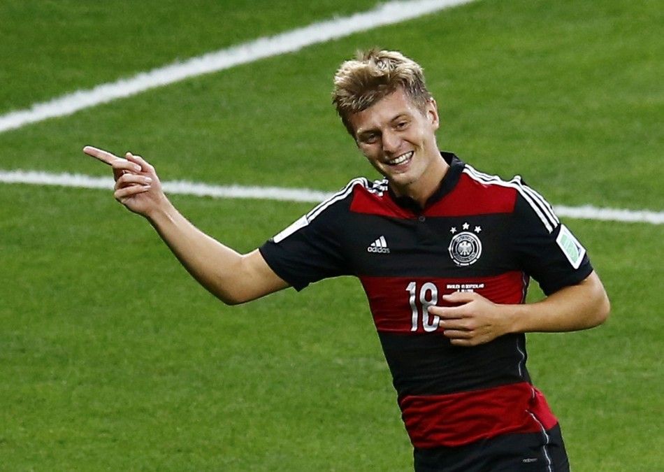 Germanys Kroos celebrates scoring his teams fourth goal against Brazil during their 2014 World Cup semi-finals at the Mineirao stadium in Belo Horizonte