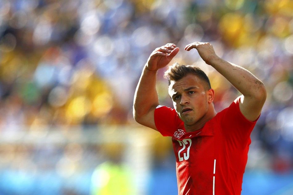 Switzerlands Xherdan Shaqiri reacts to a missed goal during World Cup round of 16 game between Argentina and Switzerland at the Corinthians arena