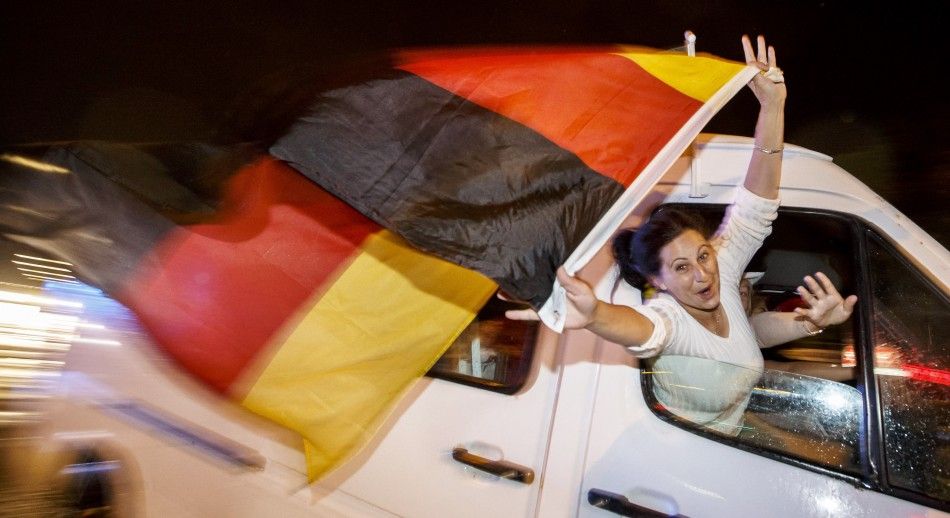 German fans celebrate as they drive along the Reeperbahn red light district in Hamburg after Germany won the World Cup soccer final against Argentina, July 13, 2014. REUTERSMorris Mac Matzen GERMANY - Tags SOCIETY SPORT SOCCER WORLD CUP TPX IMAGES OF