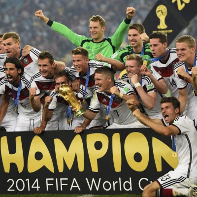Germany&#039;s Bastian Schweinsteiger (7) holds the World Cup trophy