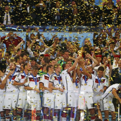 Germany&#039;s players lift the World Cup trophy as they celebrate their 2014 World Cup final win against Argentina at the Maracana stadium in Rio de Janeiro
