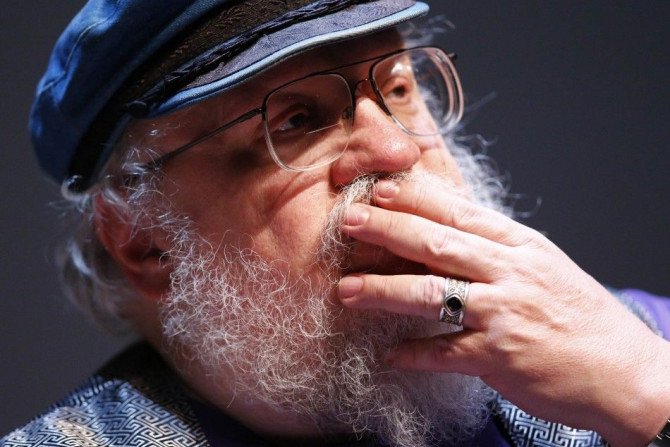 George R.R. Martin, author of the &quot;Song of Ice and Fire&quot; fantasy series that is the basis of the television series &quot;Game of Thrones&quot;, gestures during his masterclass at the Neuchatel International Fantastic Film Festival (NIFFF) in Neu