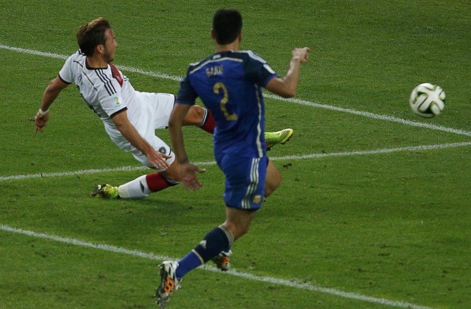 Germanys Mario Goetze L scores against Argentina during extra time in their 2014 World Cup final at the Maracana stadium in Rio de Janeiro July 13, 2014. 