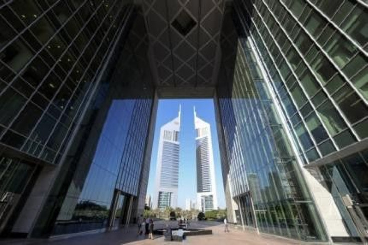 People are pictured at the Dubai International Financial Centre in this November 10, 2013 file photo
