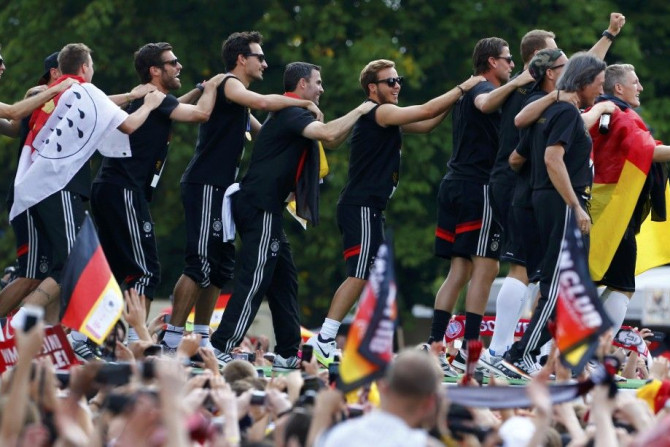 Members of Germany's 2014 Brazil World Cup squad appear on stage during celebrations