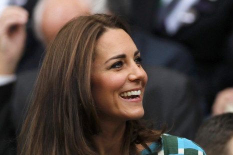 Britain's Catherine, Duchess of Cambridge sits on Centre Court at the Wimbledon Tennis Championships, in London