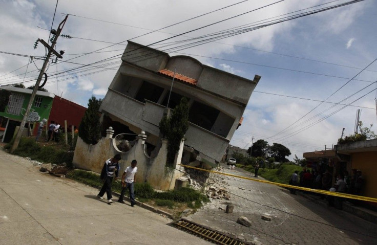 An earthquake-damaged house is pictured in the San Marcos region, in the northwest of Guatemala