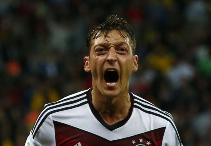 Germany&#039;s Mesut Ozil celebrates scoring their second goal during extra time in their 2014 World Cup round of 16 game against Algeria at the Beira Rio stadium in Porto Alegre