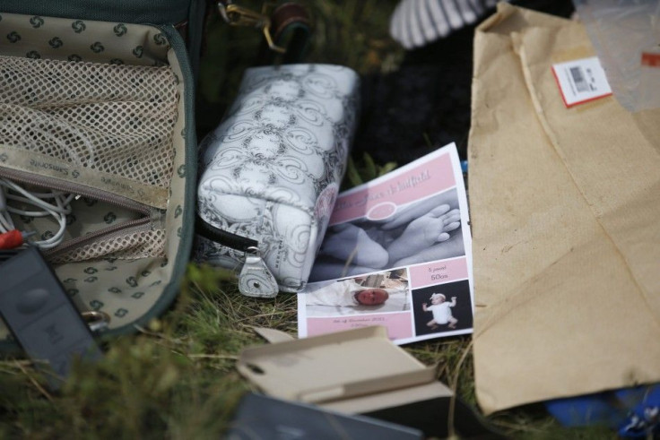 Belongings found at the crash site of Malaysia Airlines Flight MH17 are pictured near the village of Hrabove, Donetsk region, July 20, 2014. 