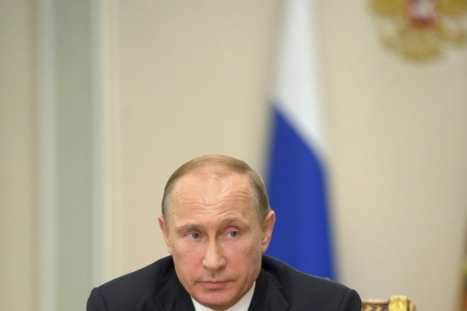 Russia's President Vladimir Putin chairs a meeting 