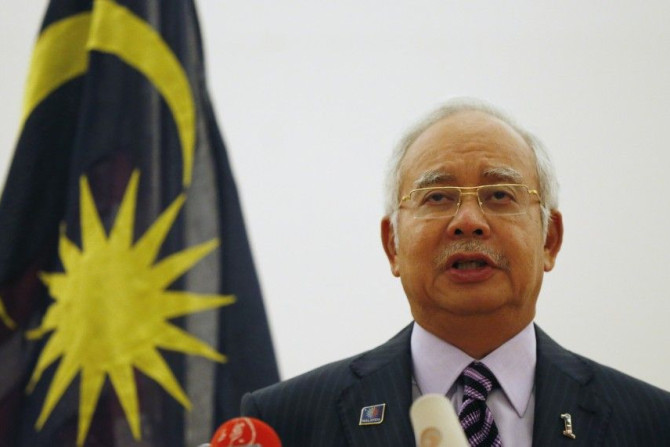 Malaysian Prime Minister Najib Razak speaks at a news conference 