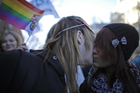 Students kiss as they march through the streets of Paris in support of the French government&#039;s draft law to legalise marriage and adoption for same-sex couples, January 27, 2013.
