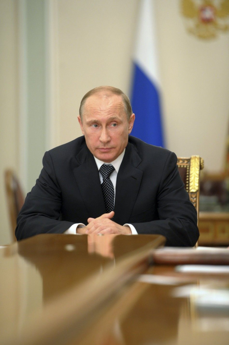 Russia's President Vladimir Putin chairs a meeting at the Novo-Ogaryovo state residence outside Moscow