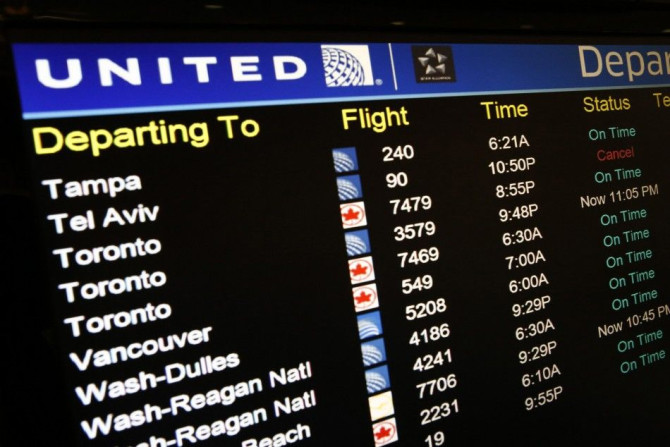A United Airlines electronic departure board is pictured inside the terminal at Newark International Airport in New Jersey