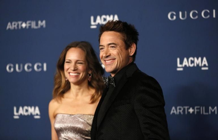Actor Robert Downey Jr. and his wife Susan pose at the Los Angeles County Museum of Art (LACMA) 2013 Art+Film Gala in Los Angeles